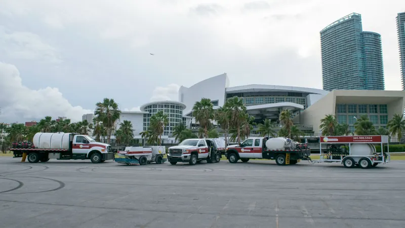 Florida Maintenance fleet outside a South Florida arena
