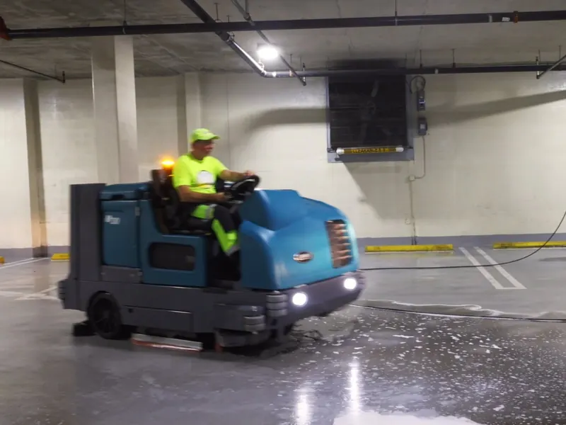 Ride-on power scrubber