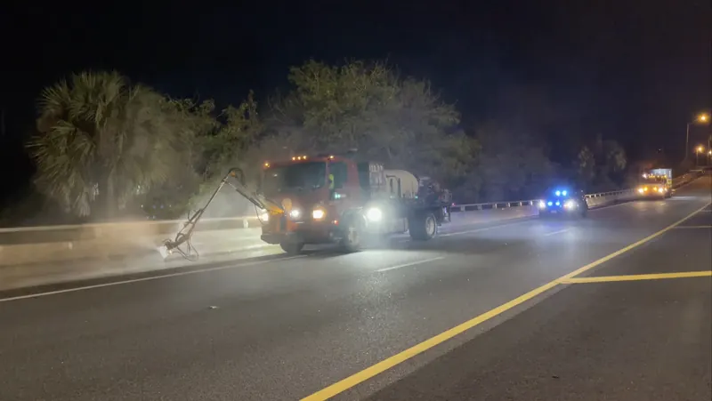 Night highway wall cleaning on the Selmon Expressway