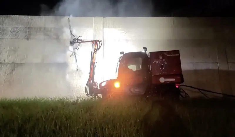 Sound wall cleaning with highway cleaning equipment